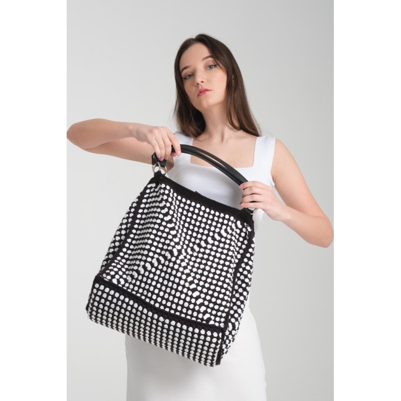 Black and white checkerboard pattern handbag