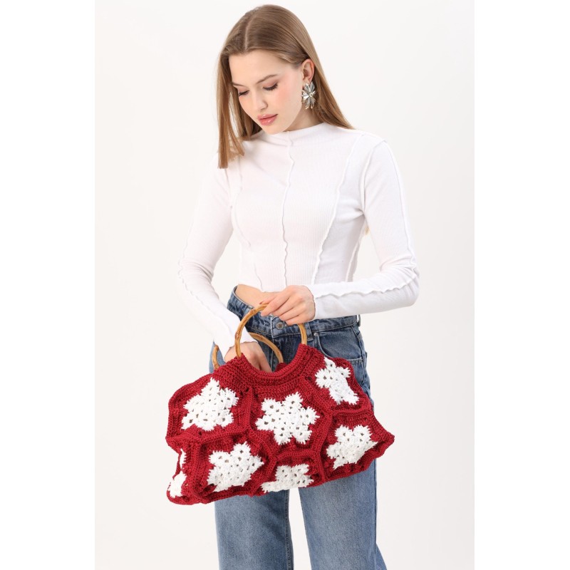 Crocheted red and white snowflake pattern handbag