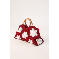 Crocheted red and white snowflake pattern handbag