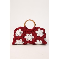 Crocheted red and white snowflake pattern handbag