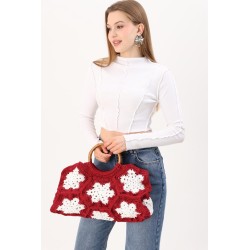 Crocheted red and white snowflake pattern handbag